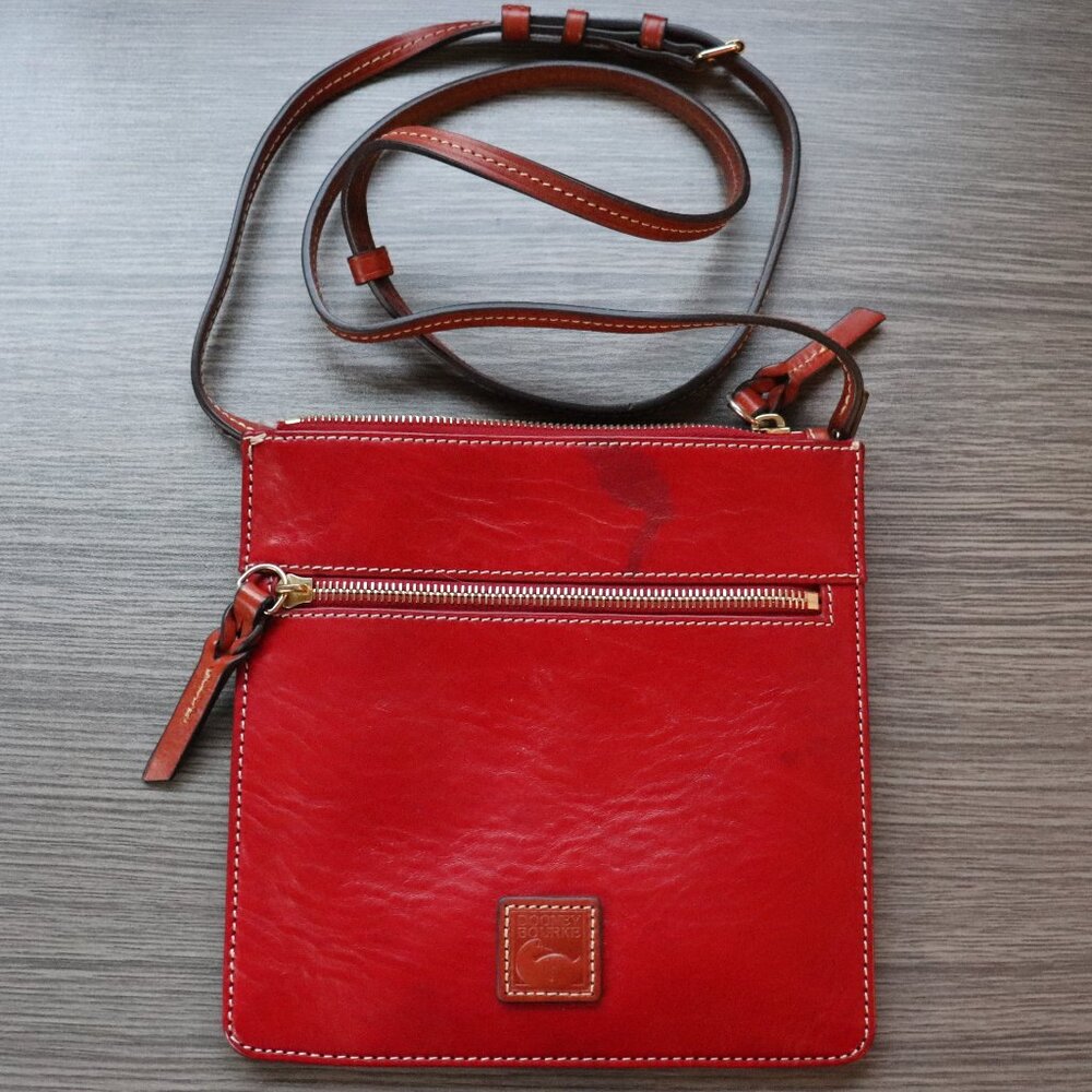 Rich red leather Dooney and Bourke crossbody purse